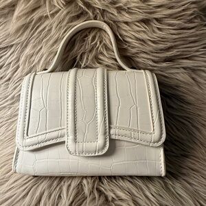 Zara Elegant White Croc-Embossed Handbag with chain strap.